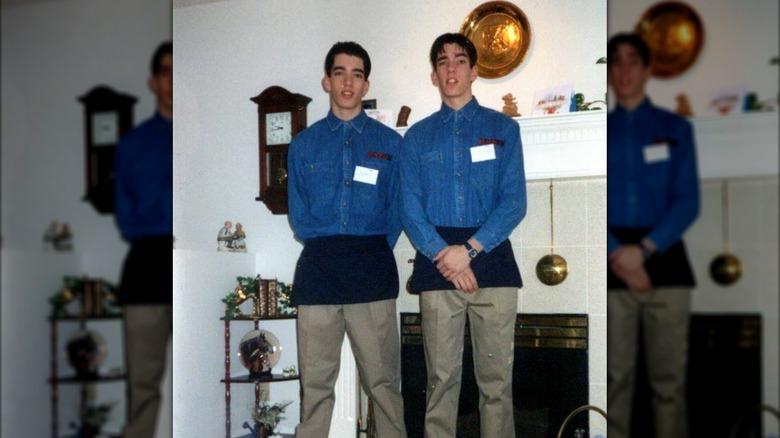 Drew and Jonathan Scott wearing Red Robin gear