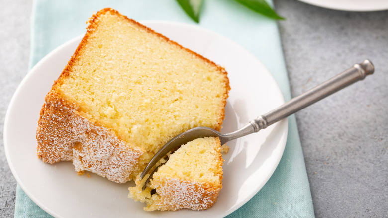 Overhead view of slice of lemon pound cake on a plate