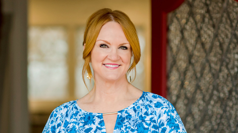 Ree Drummond smiling in blue and white shirt 