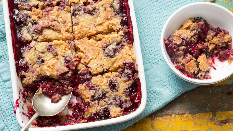 A pan of dump cake with a dish next to it