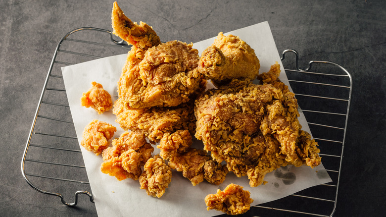 Fried chicken on paper and rack