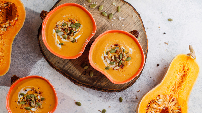 squash soup in festive bowls