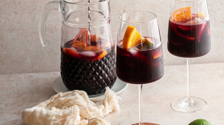 glasses and a pitcher of red sangria