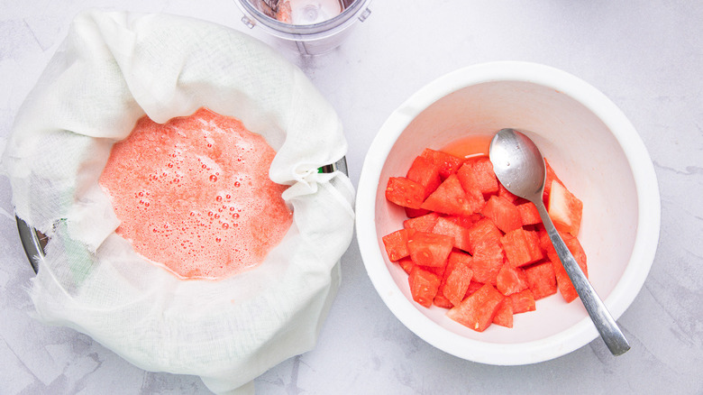 Straining watermelon juice.