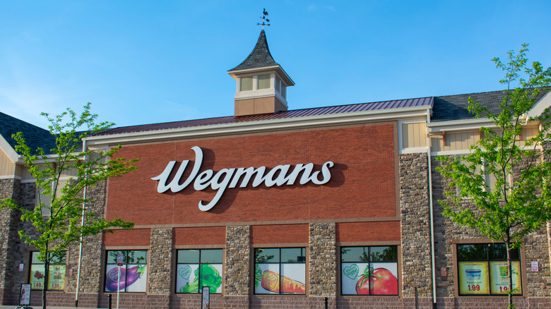 Wegmans grocery store chain against a blue sky