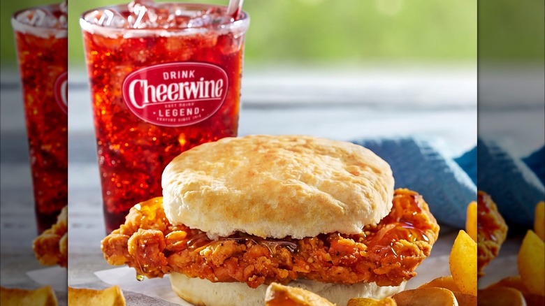 Hot chicken sandwich on biscuit with Cheerwine