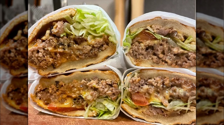 Four halves of chopped cheese sandwiches