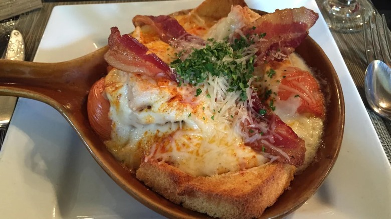 Hot borwn sandwich topped with bacon at The Hotel Brown