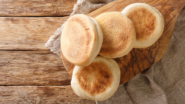 English muffins on wooden board