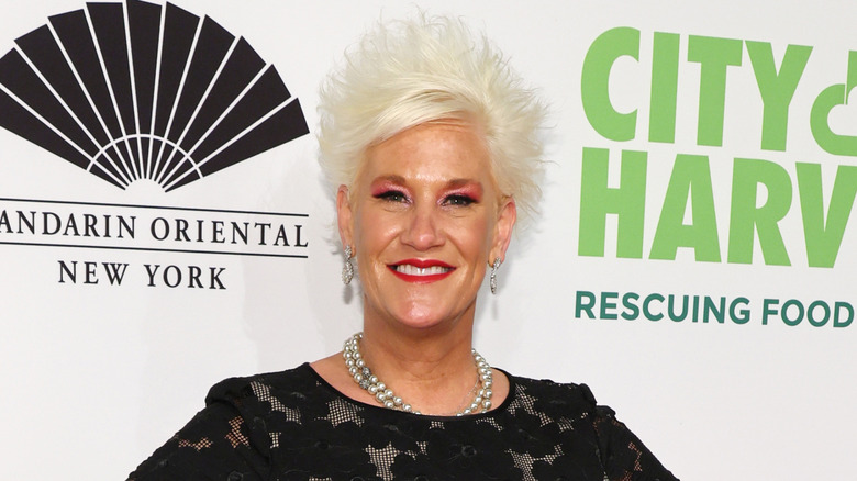Anne Burrell smiling at event