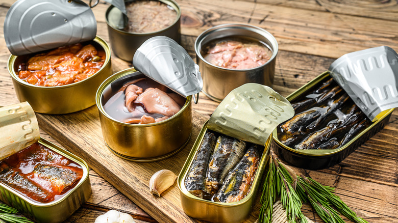 overhead view of variety of tinned fish