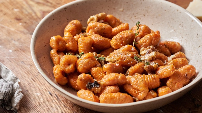 carrot gnocchi in a bowl