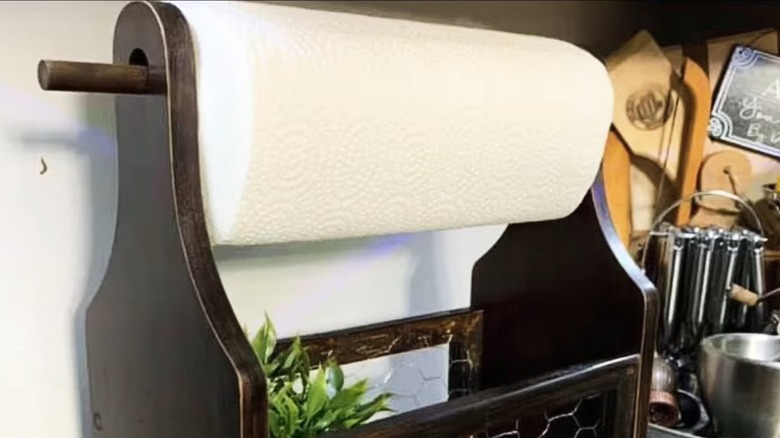 Paper towel holder made of cutting boards on kitchen counter