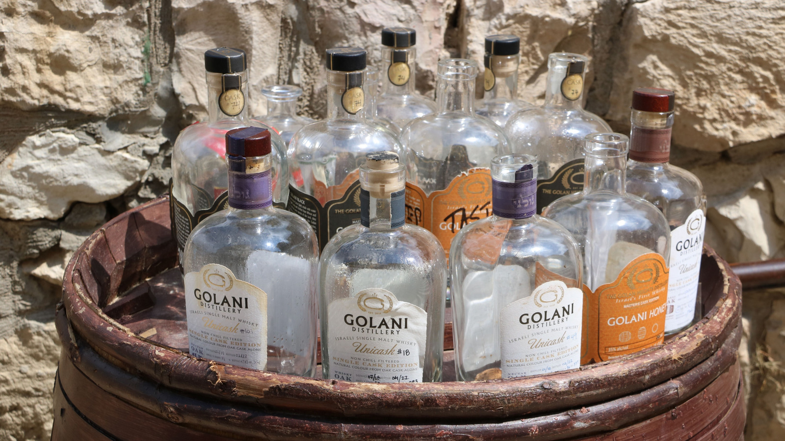 Repurpose Empty Liquor Bottles Into Beautiful Soap Dispensers With This One Simple Item