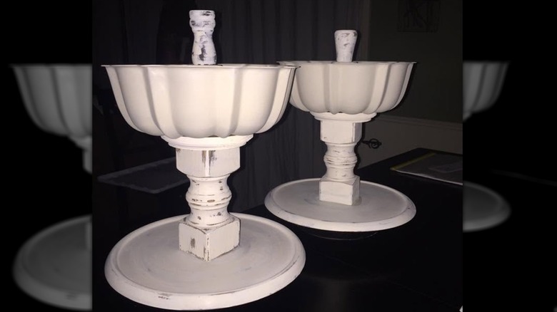 Two DIY Lazy Susan trays with a Bundt pans fitted on top