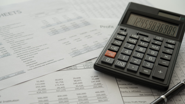 Calculator and financial statements.