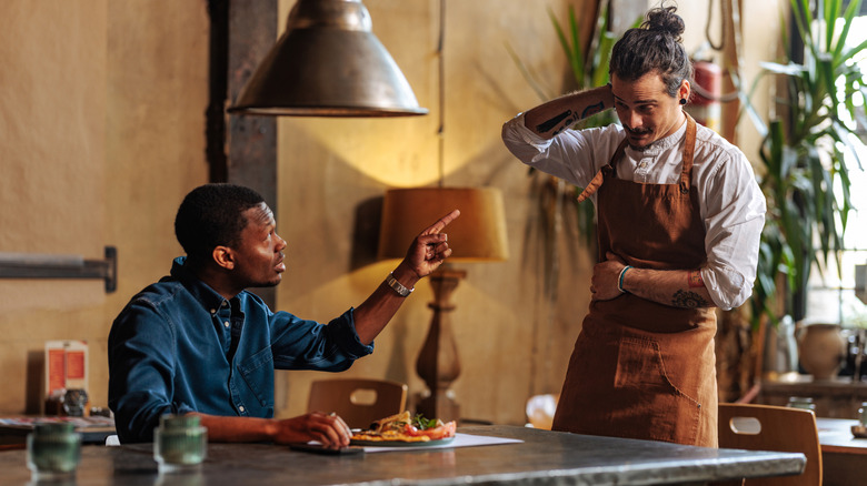 Male customer being rude to a male server.