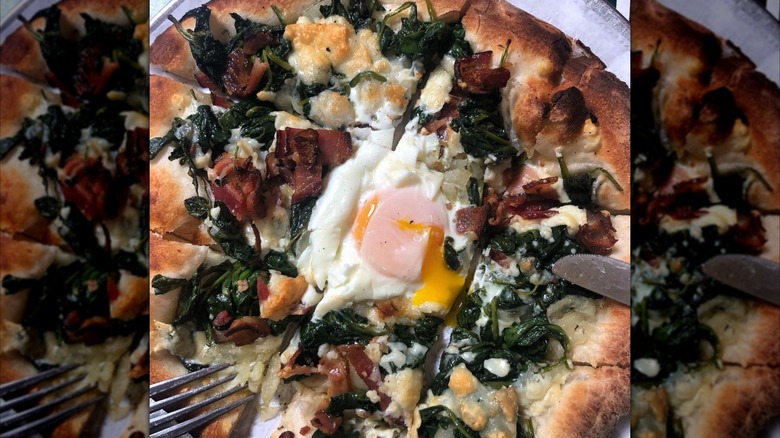 Runny egg on a pizza
