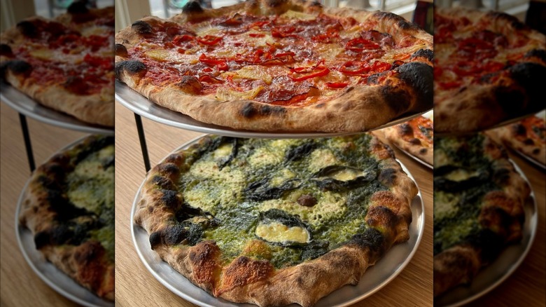 Two pizzas stacked up