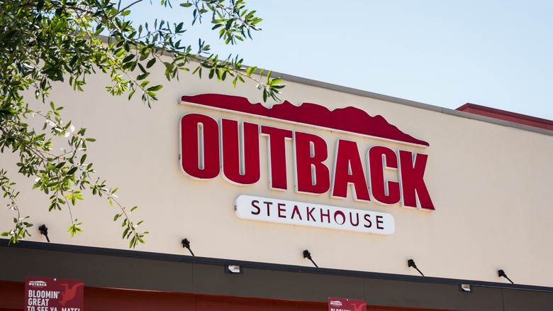 Outback Steakhouse sign on restaurant building