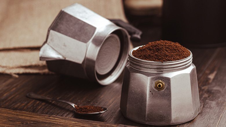 moka pot open with coffee visible