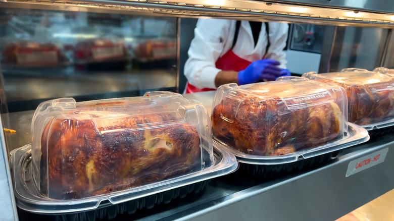 Rotisserie chickens in plastic containers