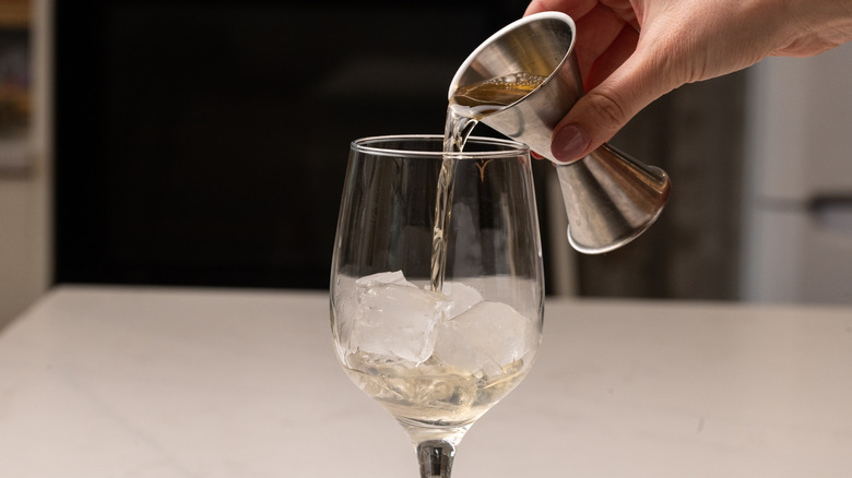 quince syrup in wine glass