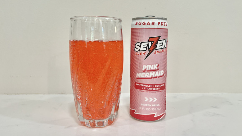 7 Brew canned Pink Mermaid Energy drink in a glass.