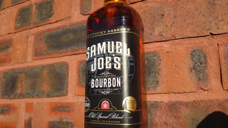 An angled close shot of the Samuel Joe's label on a brick background