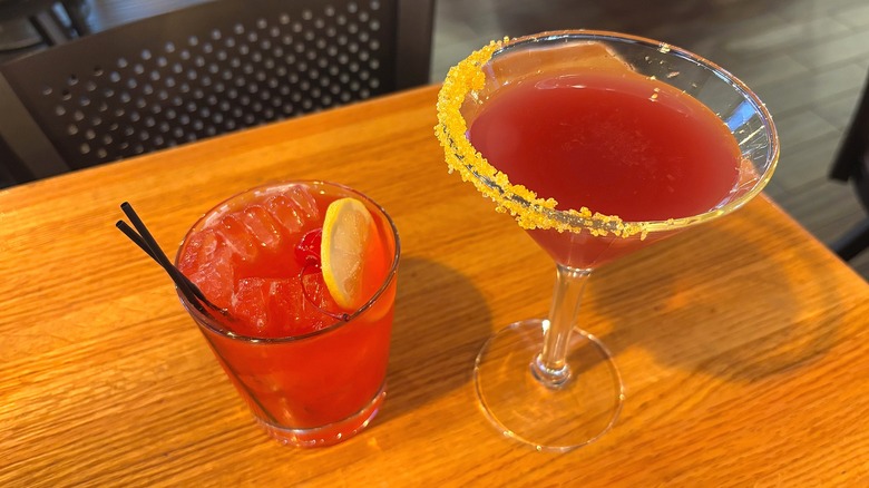 Top-down shot of two Applebee's cocktails on table in restaurant