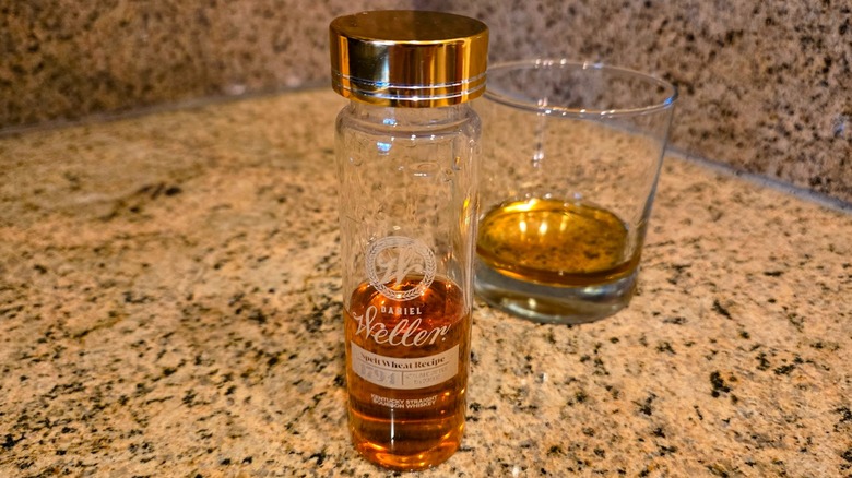 Closed sample of Daniel Weller Spelt Bourbon with glass