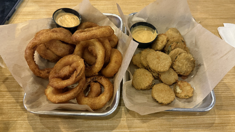 Buffalo Wild Wings bottomless apps with onion rings and fried pickles.