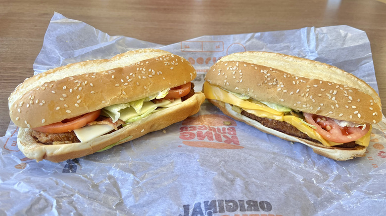 Two new chicken sandwiches on paper wrapper