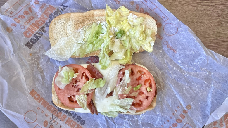 Top view of  Club Original Chicken Sandwich on paper wrapper