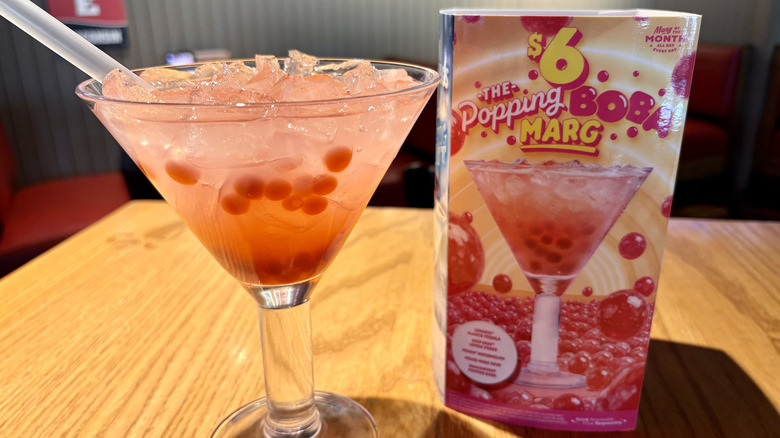 Chili's Popping Boba Marg on table next to promotional sign