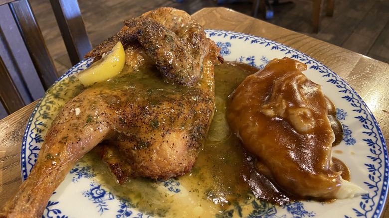 Herb Roasted Chicken with mashed potatoes and gravy