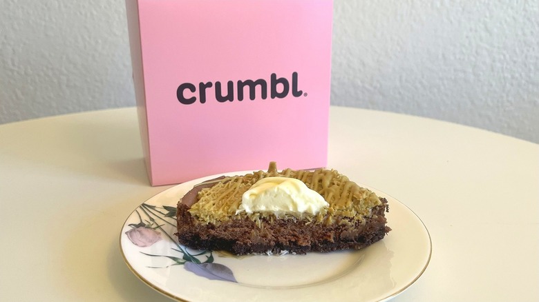 Crumbl Dubai Chocolate Cheesecake with box