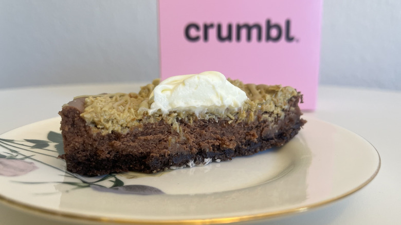 Cross section of Crumbl Dubai Chocolate Cheesecake