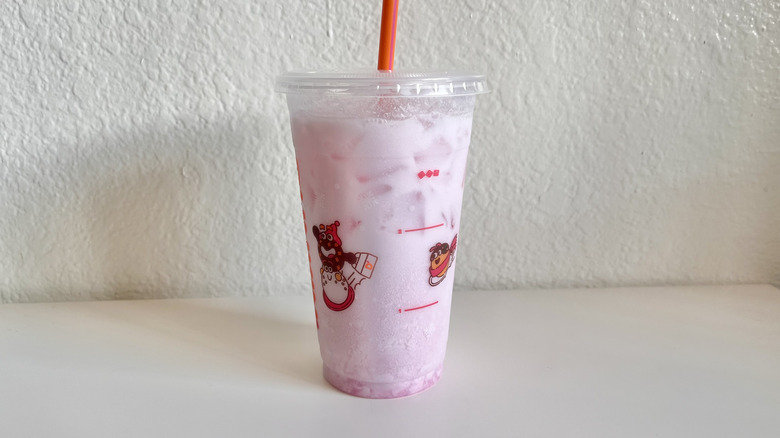 Dunkin' Strawberry Protein Refresher on a table