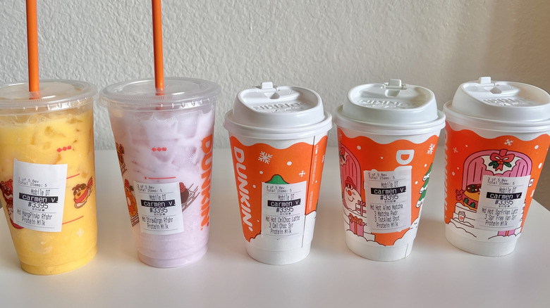 Protein Milk drinks from Dunkin' lined up on table