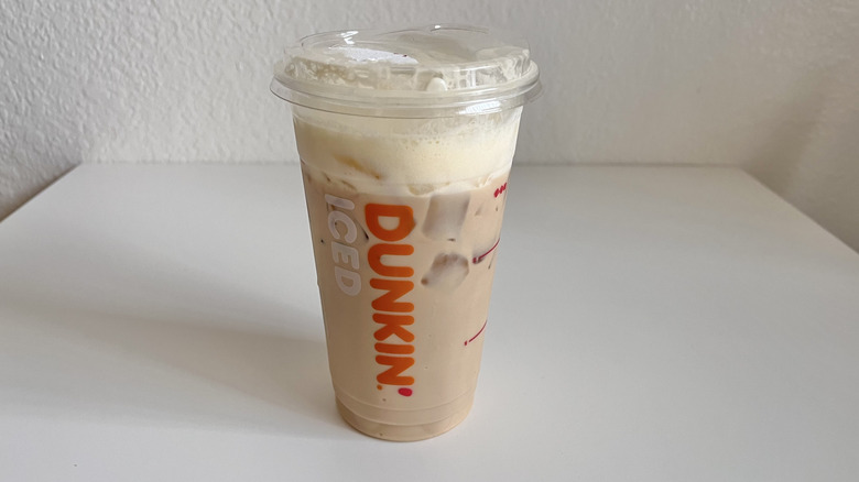 Nutty Banana Cloud Dunkalatte in a plastic cup