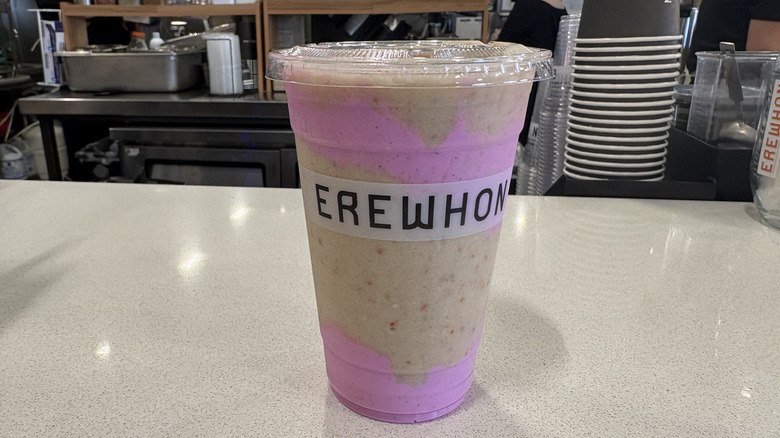 The Birthday Wish by Barbie Smoothie from Erewhon with a lid on