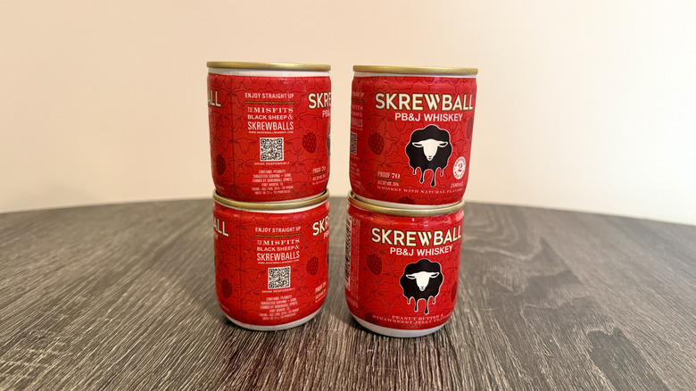 Cans of Skrewball on a table