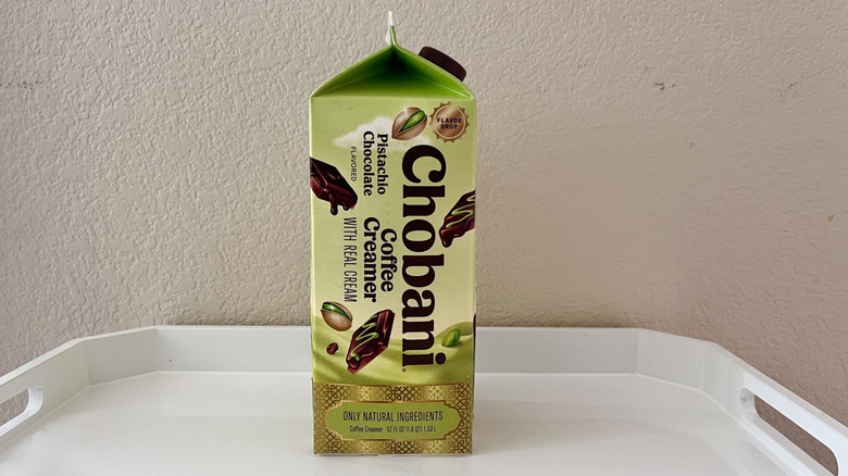 Pistachio Chocolate creamer carton on a tray