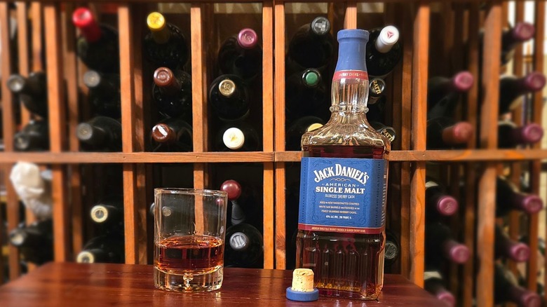 Bottle of Jack Daniel's American Single Malt with rocks glass