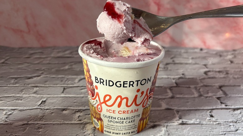 Spoonful of Jeni's Queen Charlotte Sponge Cake ice cream over pint