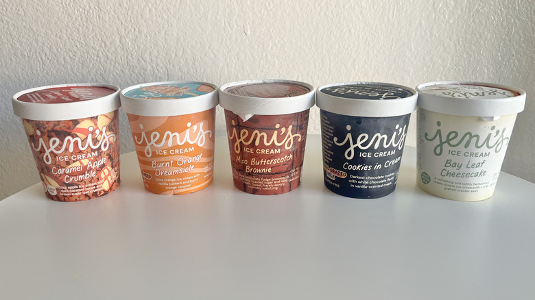 Various Jeni's fall ice cream flavor pints on a table
