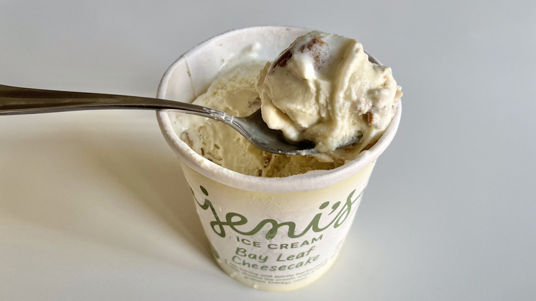 Spoon with scoop of Jeni's Bay Leaf Cheesecake ice cream