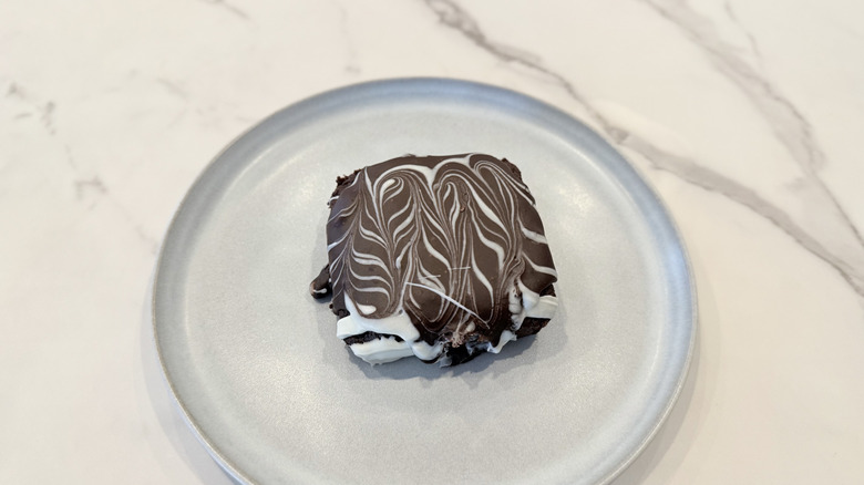 Crumbl and Martha Stewart's Classic Fudge Brownie on a plate