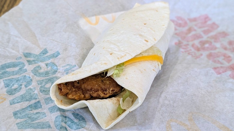 A McDonald's Snack Wrap on paper